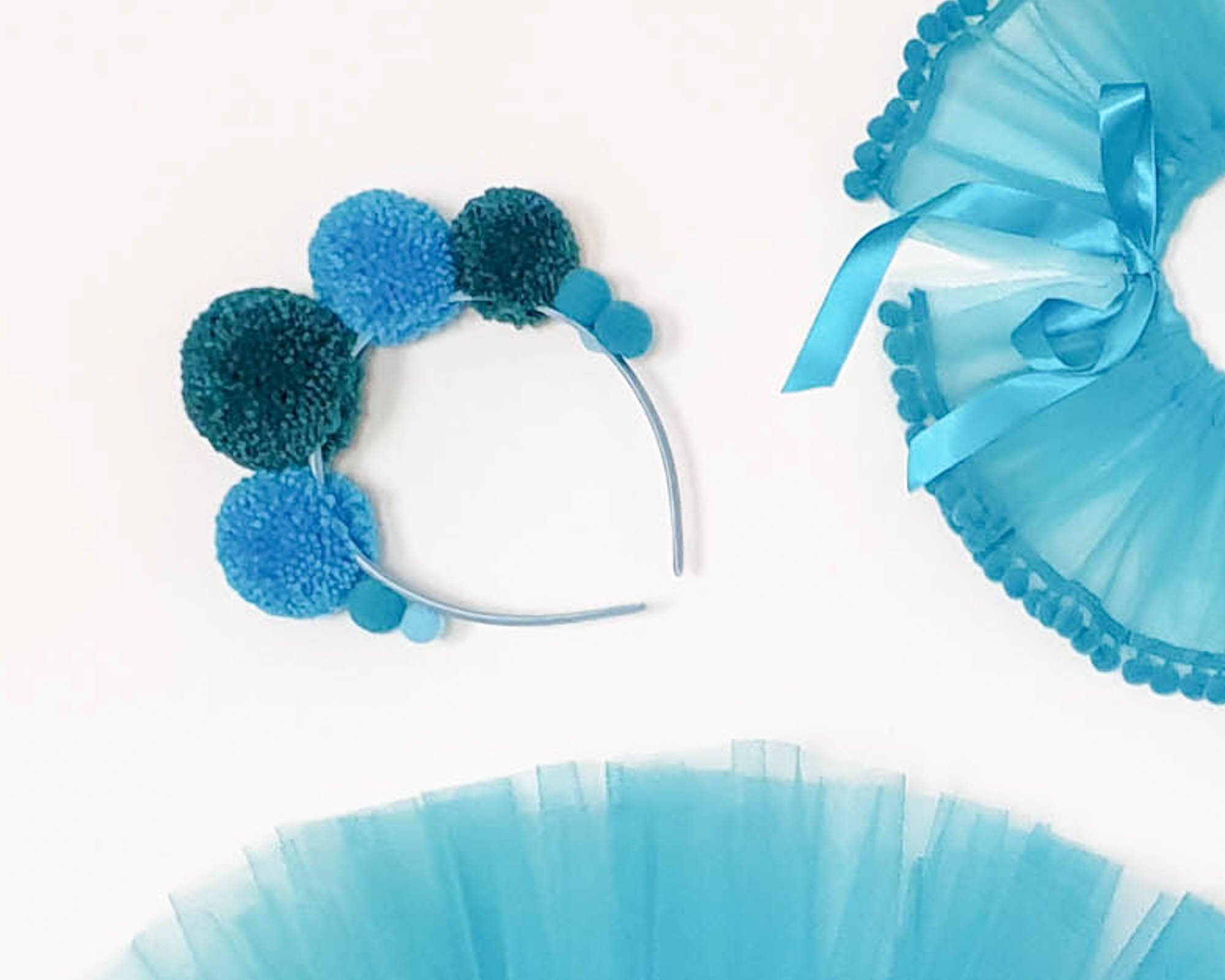 Pompom Hairband in turquoise and pink